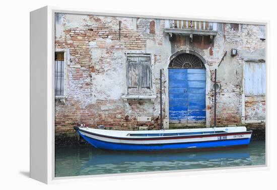 Boat And Blue Door. Venice. Venezia Province. Veneto. Italy-Oscar Dominguez-Framed Premier Image Canvas