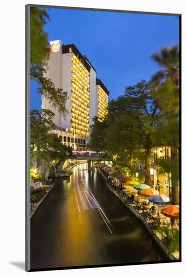 Boat Goes by on the Riverwalk in Downtown San Antonio, Texas, Usa-Chuck Haney-Mounted Photographic Print