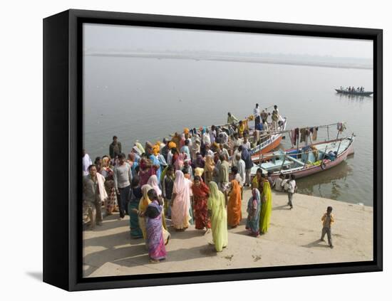 Boat on the River Ganges While a Cremation Takes Place, Varanasi, Uttar Pradesh State, India-Tony Waltham-Framed Premier Image Canvas