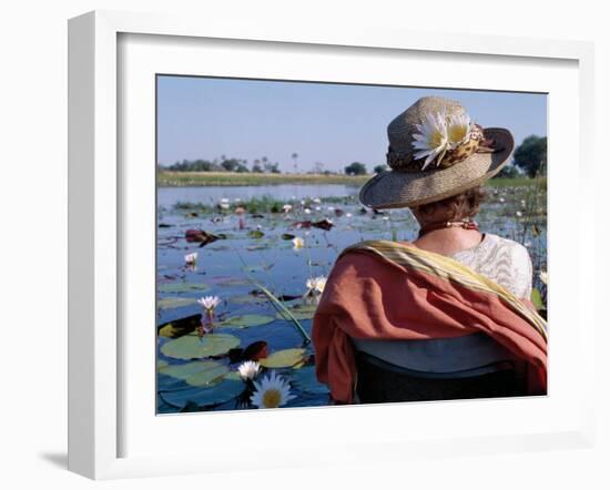 Boatman in His Dug-Out Canoe Takes a Tourist Game Viewing Along One of the Myriad Waterways of the -Nigel Pavitt-Framed Photographic Print
