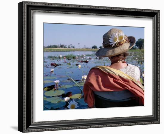 Boatman in His Dug-Out Canoe Takes a Tourist Game Viewing Along One of the Myriad Waterways of the -Nigel Pavitt-Framed Photographic Print