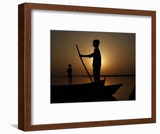 Boatman Prepares to Anchor His Boat, after the Day's Work in River Ganges, in Allahabad, India-null-Framed Photographic Print