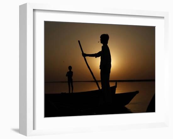 Boatman Prepares to Anchor His Boat, after the Day's Work in River Ganges, in Allahabad, India-null-Framed Photographic Print