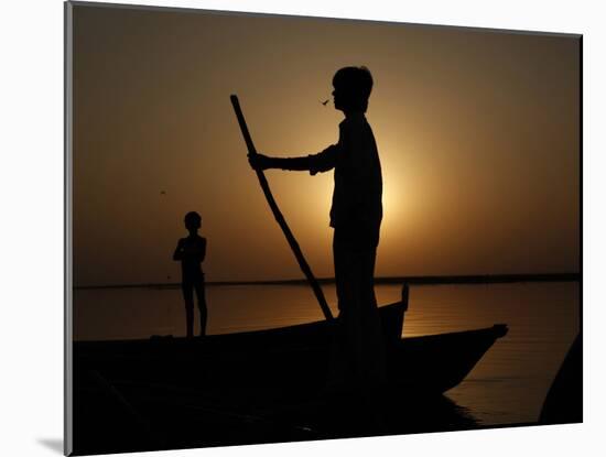 Boatman Prepares to Anchor His Boat, after the Day's Work in River Ganges, in Allahabad, India-null-Mounted Photographic Print