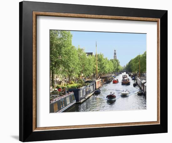 Boats Cruise Along a Canal with the Zuiderkerk Bell-Tower in the Background, Amsterdam, Netherlands-Miva Stock-Framed Photographic Print