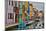 Boats Docked Along Canal with the Colorful Homes of Burano, Italy-Darrell Gulin-Mounted Photographic Print