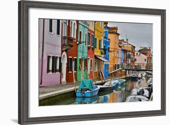 Boats Docked Along Canal with the Colorful Homes of Burano, Italy-Darrell Gulin-Framed Photographic Print