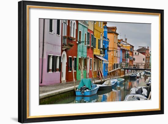 Boats Docked Along Canal with the Colorful Homes of Burano, Italy-Darrell Gulin-Framed Photographic Print