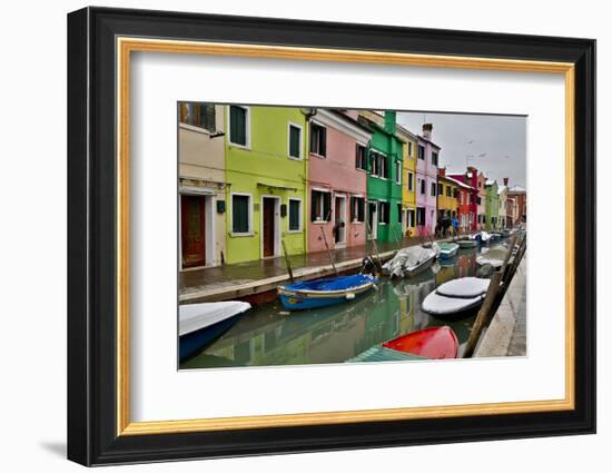 Boats Docked Along Canal with the Colorful Homes of Burano, Italy-Darrell Gulin-Framed Photographic Print