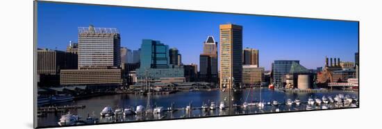 Boats moored at Inner Harbor viewed from Federal Hill with city in the background, Baltimore, Ma...-null-Mounted Photographic Print