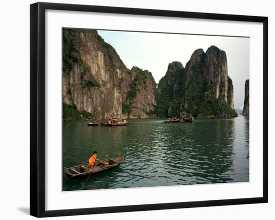 Boats Move Among the Craggy Islands of Halong Bay-null-Framed Photographic Print