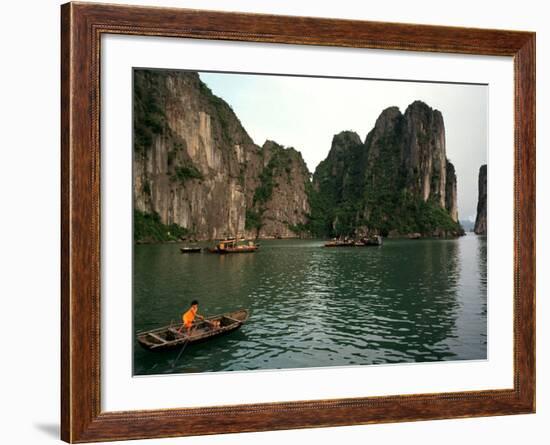 Boats Move Among the Craggy Islands of Halong Bay-null-Framed Photographic Print