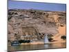 Boats on Nile River Passing Massive Statues of Pharoh Ramses II at Door to Queen Nefertari's Temple-James Burke-Mounted Photographic Print