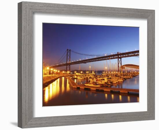 Boats on the River Tagus Move at Night in the Doca De Santa Amaro Marina under the 25 April Bridge,-Stuart Forster-Framed Photographic Print