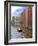 Boats Pass by Waterfront Warehouses and Lofts, Speicherstadt Warehouse District, Hamburg, Germany-Miva Stock-Framed Photographic Print