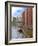 Boats Pass by Waterfront Warehouses and Lofts, Speicherstadt Warehouse District, Hamburg, Germany-Miva Stock-Framed Photographic Print