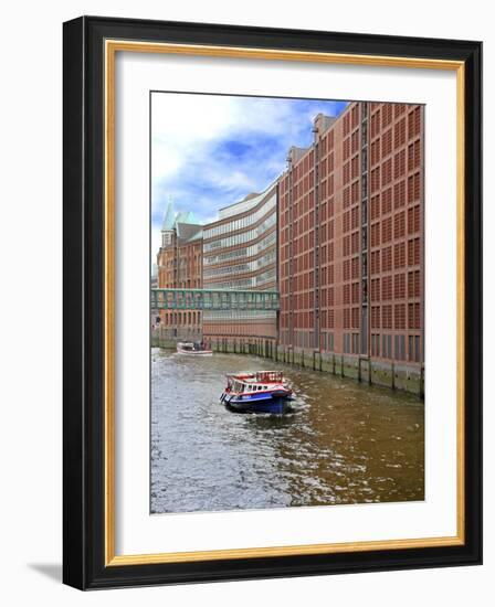 Boats Pass by Waterfront Warehouses and Lofts, Speicherstadt Warehouse District, Hamburg, Germany-Miva Stock-Framed Photographic Print