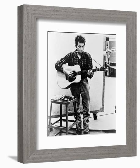 Bob Dylan Playing Guitar and Harmonica into Microphone. 1965-null-Framed Art Print