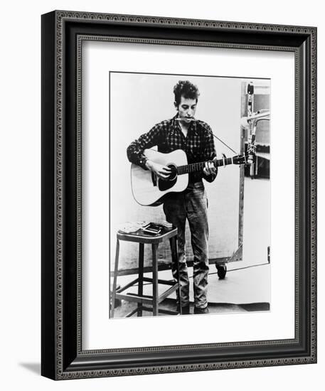 Bob Dylan Playing Guitar and Harmonica into Microphone. 1965-null-Framed Art Print