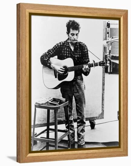 Bob Dylan Playing Guitar and Harmonica into Microphone. 1965-null-Framed Stretched Canvas