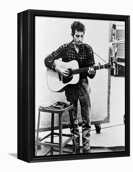 Bob Dylan Playing Guitar and Harmonica into Microphone. 1965-null-Framed Stretched Canvas