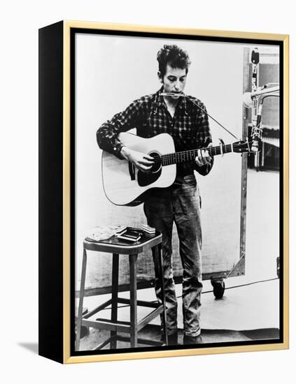 Bob Dylan Playing Guitar and Harmonica into Microphone. 1965-null-Framed Stretched Canvas