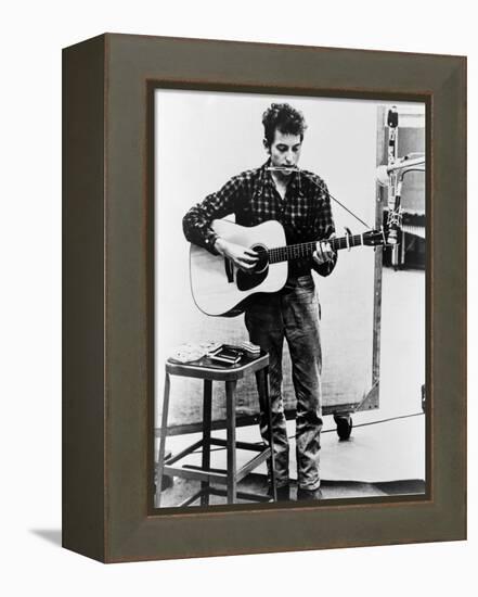 Bob Dylan Playing Guitar and Harmonica into Microphone. 1965-null-Framed Stretched Canvas