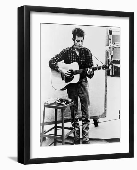 Bob Dylan Playing Guitar and Harmonica into Microphone. 1965--Framed Art Print