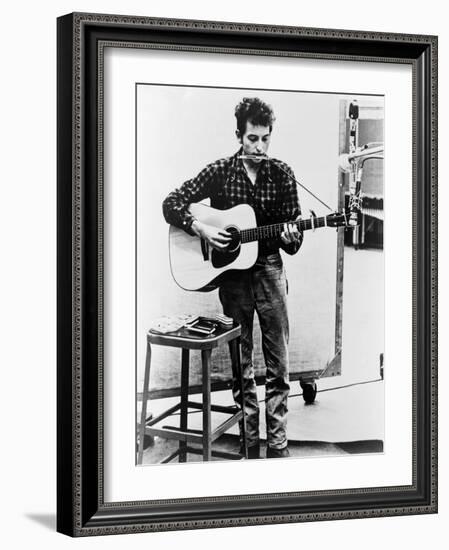 Bob Dylan Playing Guitar and Harmonica into Microphone. 1965-null-Framed Art Print