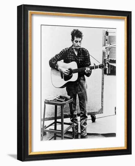 Bob Dylan Playing Guitar and Harmonica into Microphone. 1965-null-Framed Art Print