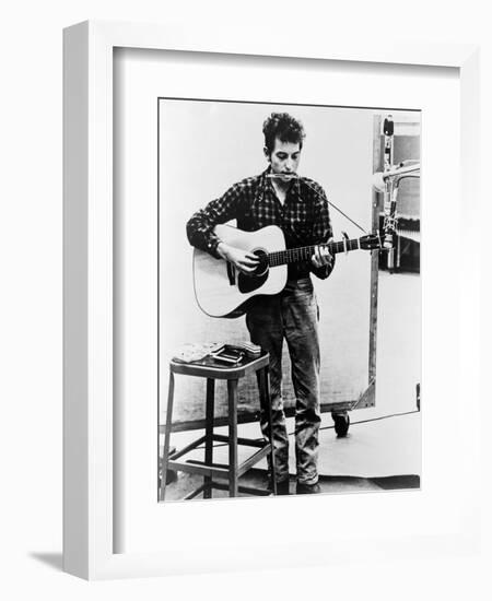 Bob Dylan Playing Guitar and Harmonica into Microphone. 1965-null-Framed Premium Giclee Print