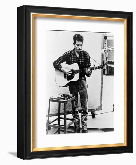 Bob Dylan Playing Guitar and Harmonica into Microphone. 1965-null-Framed Premium Giclee Print