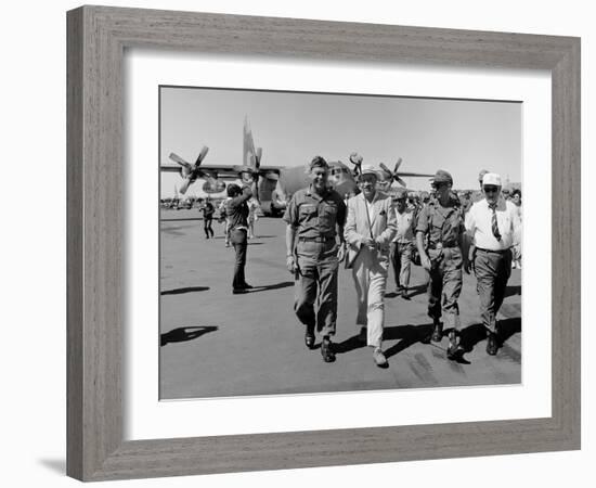 Bob Hope, Walks with Generals at Pleiku Air Base, South Vietnam, Dec. 19, 1966-null-Framed Photo