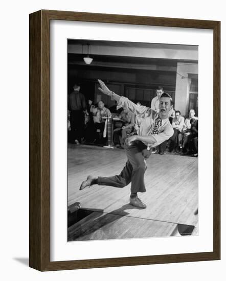 Bob Jones Bowling with a Cigar Hanging Out of His Mouth-Ralph Morse-Framed Photographic Print