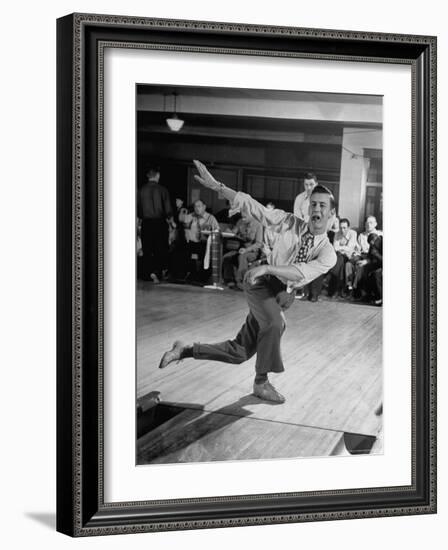 Bob Jones Bowling with a Cigar Hanging Out of His Mouth-Ralph Morse-Framed Photographic Print