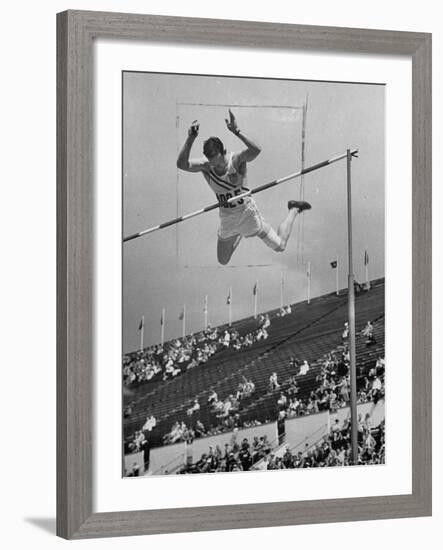 Bob Richards Competing in the High Jump at 1952 Olympics-Ralph Crane-Framed Premium Photographic Print