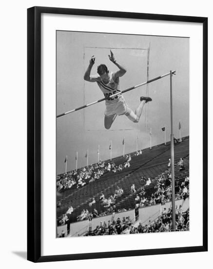 Bob Richards Competing in the High Jump at 1952 Olympics-Ralph Crane-Framed Premium Photographic Print