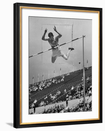 Bob Richards Competing in the High Jump at 1952 Olympics-Ralph Crane-Framed Premium Photographic Print