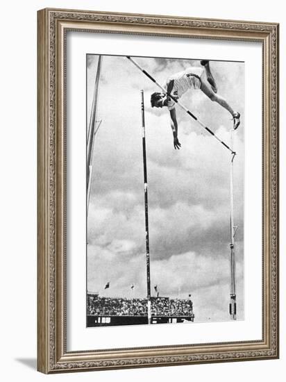 Bob Richards Winning the Gold Medal for the Pole Vault in the 1956 Melbourne Olympics-null-Framed Photographic Print