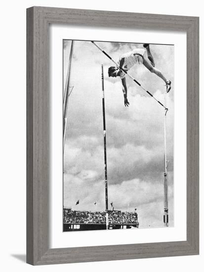 Bob Richards Winning the Gold Medal for the Pole Vault in the 1956 Melbourne Olympics-null-Framed Photographic Print