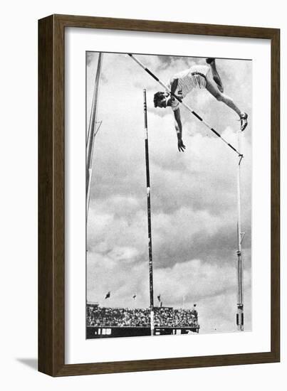 Bob Richards Winning the Gold Medal for the Pole Vault in the 1956 Melbourne Olympics-null-Framed Photographic Print