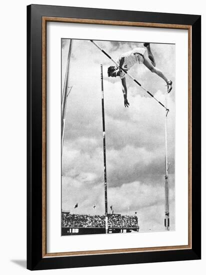 Bob Richards Winning the Gold Medal for the Pole Vault in the 1956 Melbourne Olympics-null-Framed Photographic Print