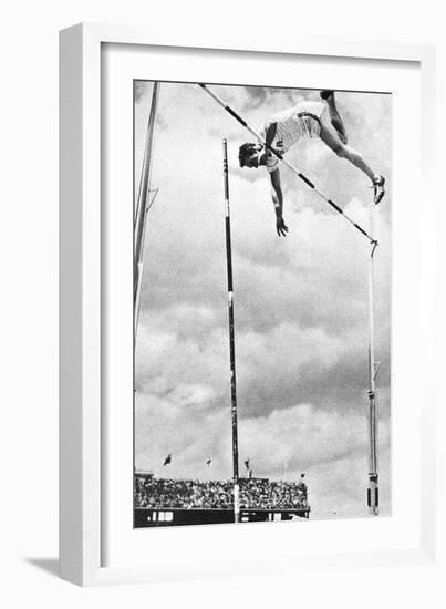 Bob Richards Winning the Gold Medal for the Pole Vault in the 1956 Melbourne Olympics-null-Framed Photographic Print