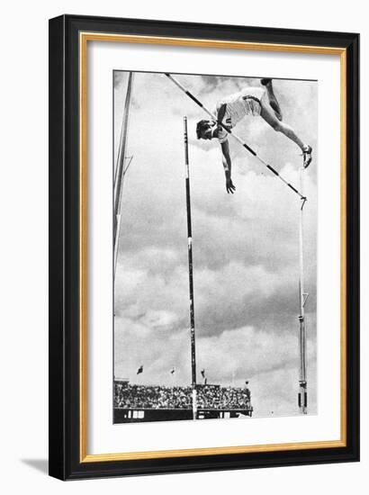 Bob Richards Winning the Gold Medal for the Pole Vault in the 1956 Melbourne Olympics-null-Framed Photographic Print