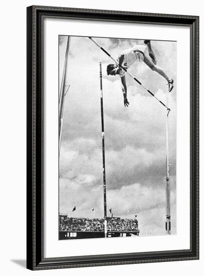 Bob Richards Winning the Gold Medal for the Pole Vault in the 1956 Melbourne Olympics-null-Framed Photographic Print
