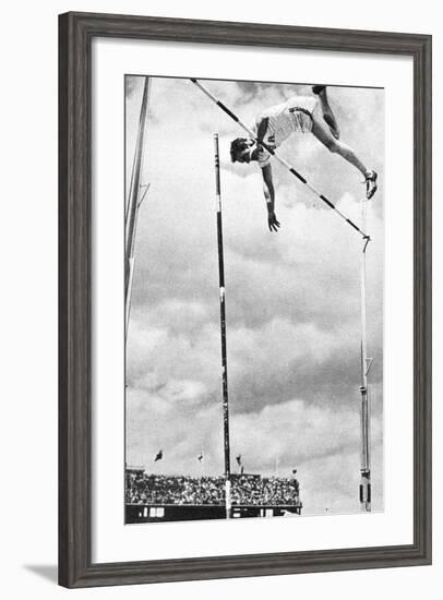 Bob Richards Winning the Gold Medal for the Pole Vault in the 1956 Melbourne Olympics-null-Framed Photographic Print