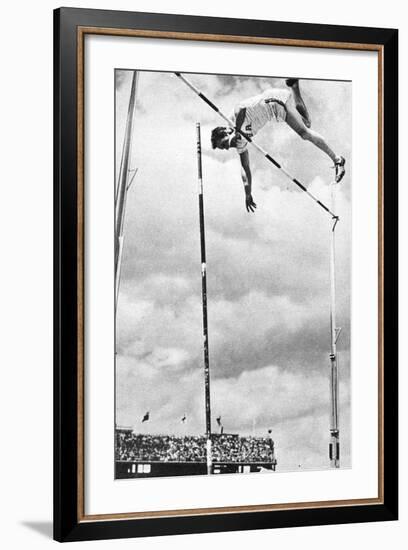 Bob Richards Winning the Gold Medal for the Pole Vault in the 1956 Melbourne Olympics-null-Framed Photographic Print