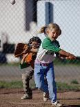 Little Girl Playing Softball-Bob Winsett-Laminated Photographic Print