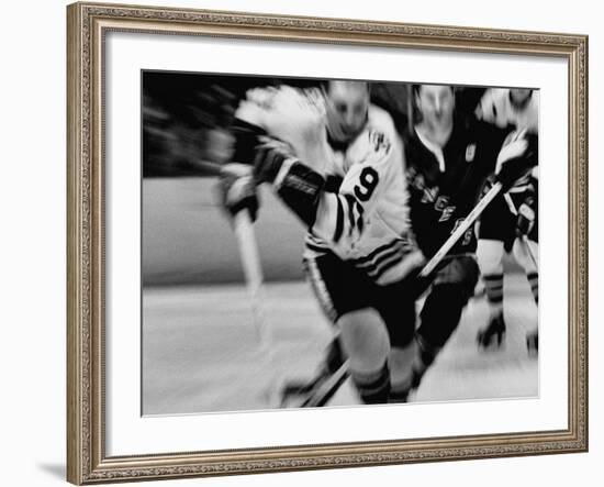 Bobby Hull No.9 in Action During Game Between Chicago Black Hawks and NY Rangers-Art Rickerby-Framed Premium Photographic Print