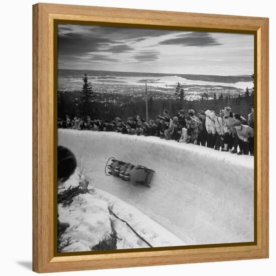 Bobsled Racing by on a Big Vendleboe Curve During the Winter Olympics-Nat Farbman-Framed Premier Image Canvas